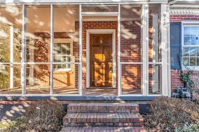 Property entrance with brick siding