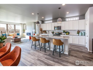 EXAMPLE PHOTO: KITCHEN W/ ISLAND OPEN TO GREAT ROOM