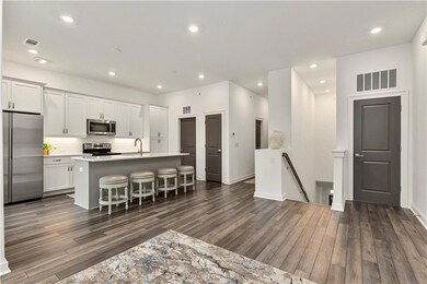 Kitchen with appliances with stainless steel finis