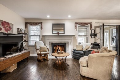 Inviting Gas Fireplace with an Insert that evokes scouting days and campfires!
