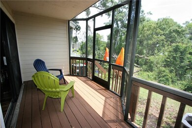 Screened Lanai overlooking Wooded Lot and Water Vi