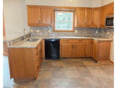Kitchen has a dishwasher and over the range microw