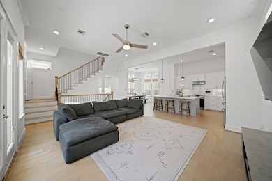 The second floor living area features an open-conc