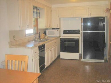 Kitchen. Updated kitchen cabinets, double bowl sta
