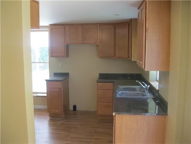 Kitchen. additiona side view by sliding glass door