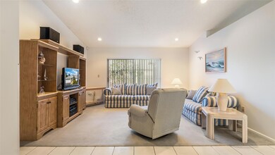 High ceilings and recessed lighting give the livin