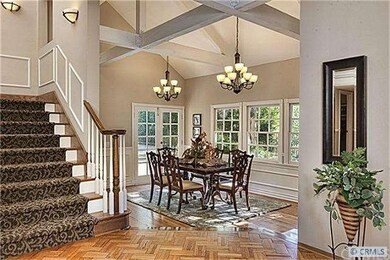 Formal dining room. (Note the open-beamed ceiling.