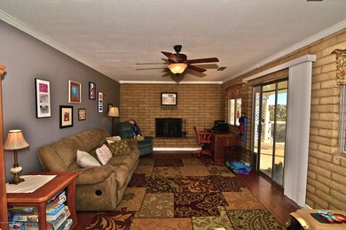downstairs family room with fireplace in