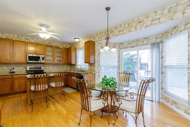 Kitchen and Breakfast Room with Hardwood Flooring