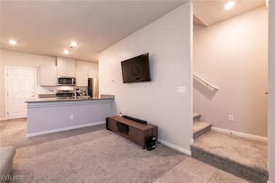 Kitchen featuring appliances with stainless steel