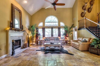 The great room with 18 foot ceilings is the focal point of the home. The open floor plan of this home makes the home seem like the home is twice the size. This is a great home for entertaining. I have had parties with over 100 people.