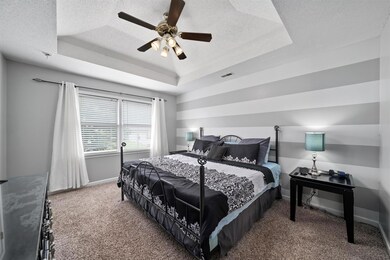 Master Suite with Dual Walk In Closets & En Suite Bathroom