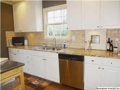 Notice the under counter lighting & granite counte