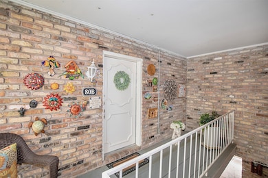 Entry to the two-bedroom condo that sits on the fa
