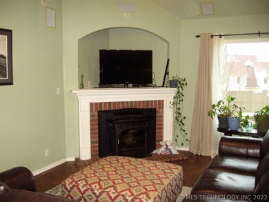 Corner fireplace had gas pellet insert.