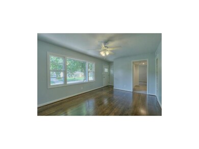 Enjoy built-ins and large windows that span the fr