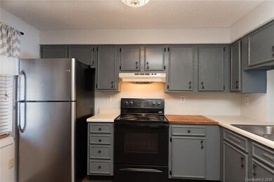 Kitchen with SS refrigerator