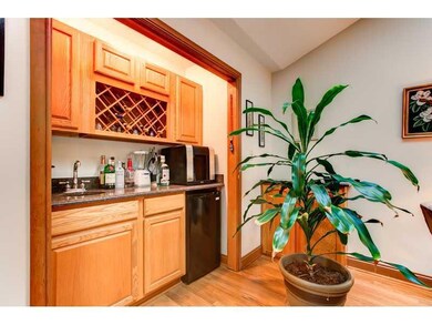 Other. Wet bar with fridge, wine rack and cabinets