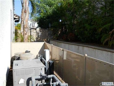 side yard with pool equipment
