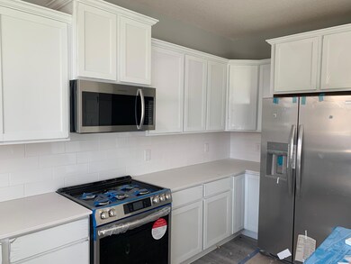Look at this kitchen! Model home.