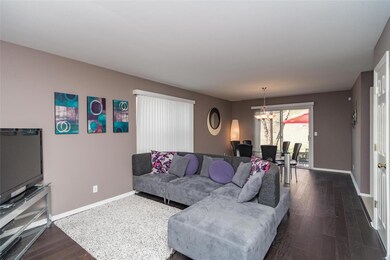 Large open living and dining room area.