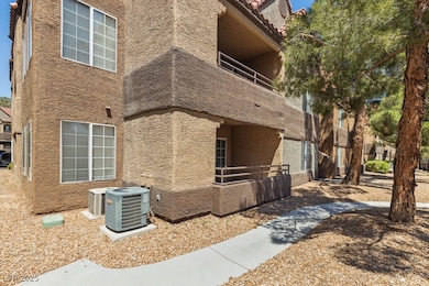 View of side of home with central air condition un