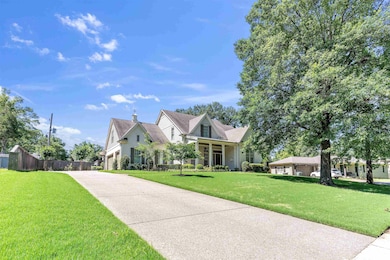 View of front of house featuring driveway