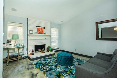 The living area with the fireplace to keep you toa