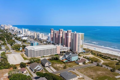 Bird's eye view featuring a beach view and a water