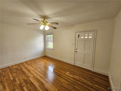 Unfurnished room featuring dark hardwood / wood-st