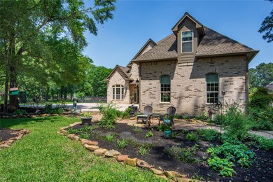 Charming brick home with a beautifully landscaped