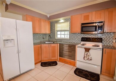 Kitchen with tile back splash