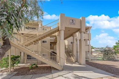View of property with stairway
