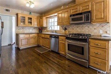 Beautiful Kitchen with custom cabinetry and stainl
