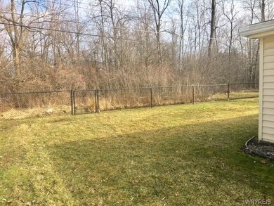 Fully fenced backyard with no rear neighbors!!