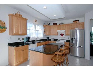 Kitchen. Center island kitchen with granite counte