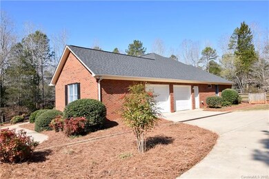 Extended Two Car Garage with lots of parking in th