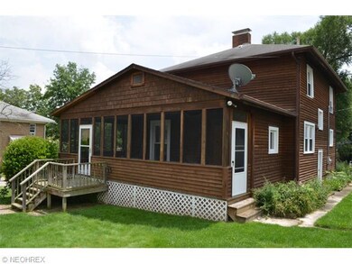 This back view shows the cool screened in porch on