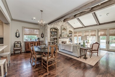 Family room and breakfast room with walnut floors,