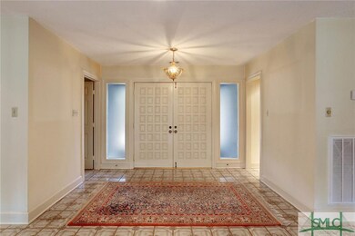ENTRANCE FOYER. Double hung doors open to this ent