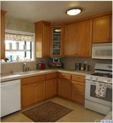 Kitchen and Bay Window Looking Out to Front Yard