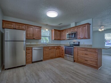 View of remodeled KITCHEN with new WOOD CABINETS, 