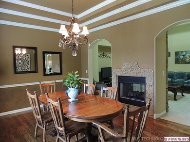 The formal dining room shares the duel fire place