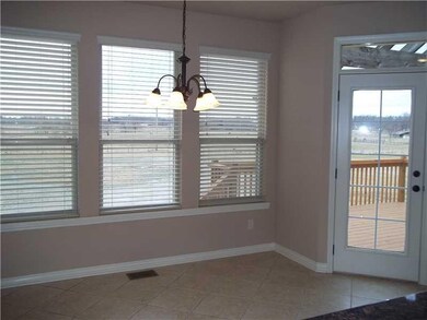 Dining Room. Large windows in the eat-in kitchen,