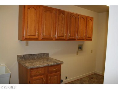Laundry - Utility room with Cabinets and folding c