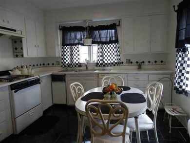 Kitchen bright and cherry showing room for table a