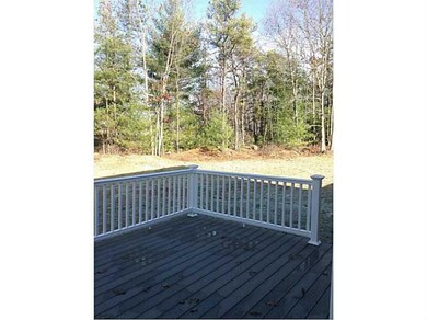 Patio/Deck. Spacious deck overlooking flat wooded