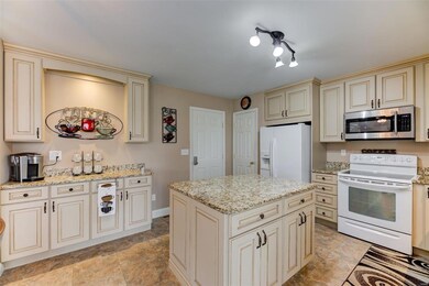 Custom cabinetry and granite countertops.
