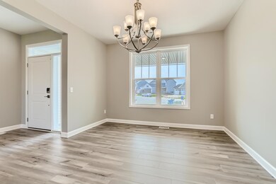 Front formal dining space or morning sitting area. Photos of available home! Home is available for tours!