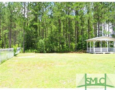 Yard/Garden. The back yard is immense, trim and pr
